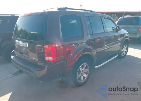 2011 Honda Pilot Touring z USA, uszkodzony, nr VIN 5FNYF3H90BB030206